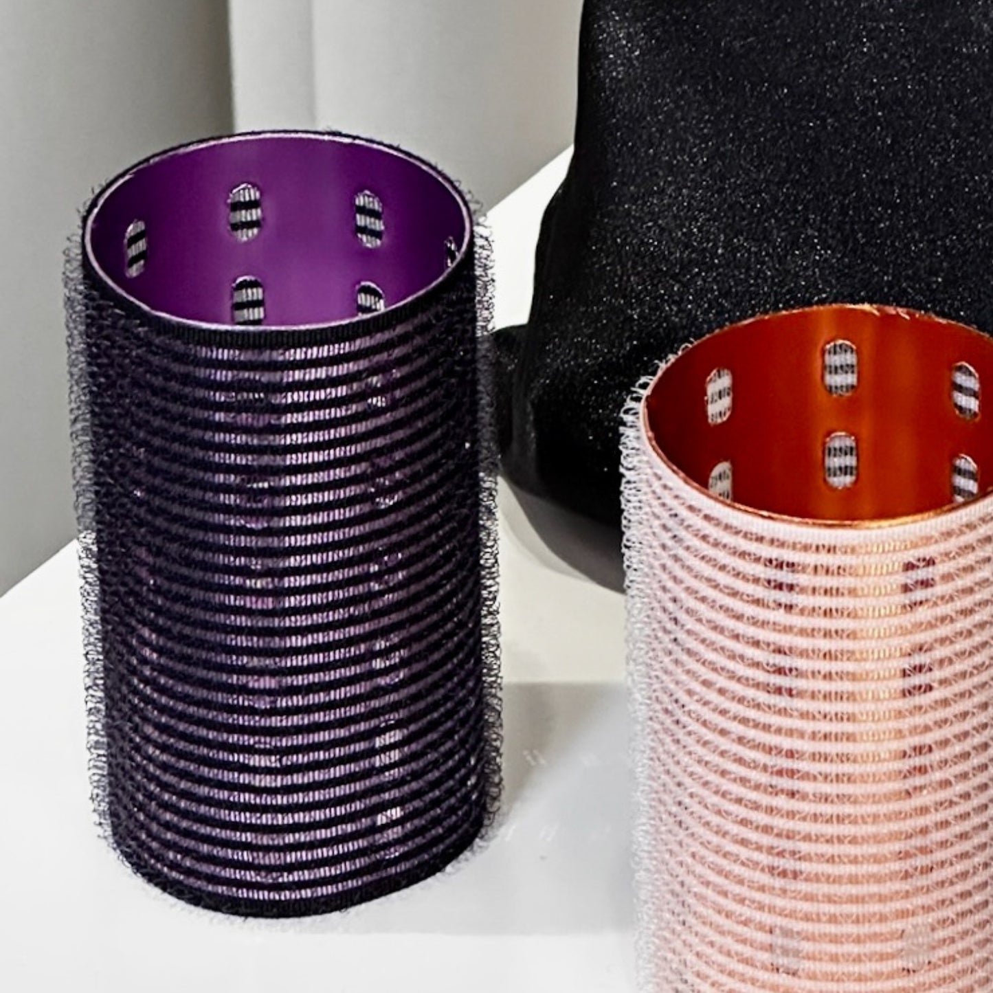 purple set of  hair rollers