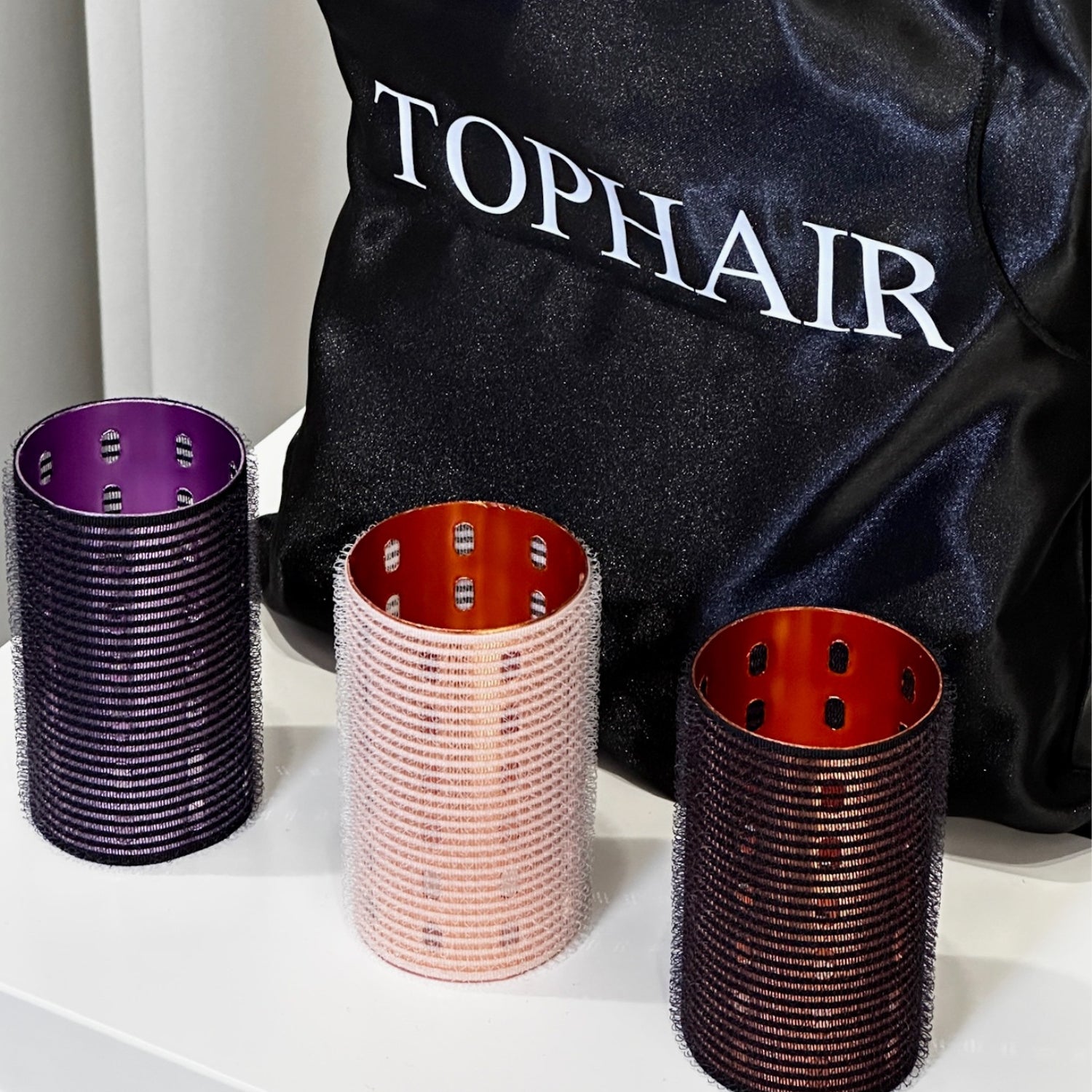 The set of eight volume rollers for hair 